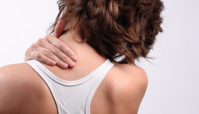 the girl has a pain in her neck